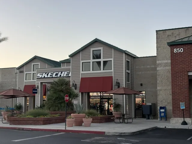 Trading Post retail center in Clovis, CA, with Skechers storefront and outdoor seating